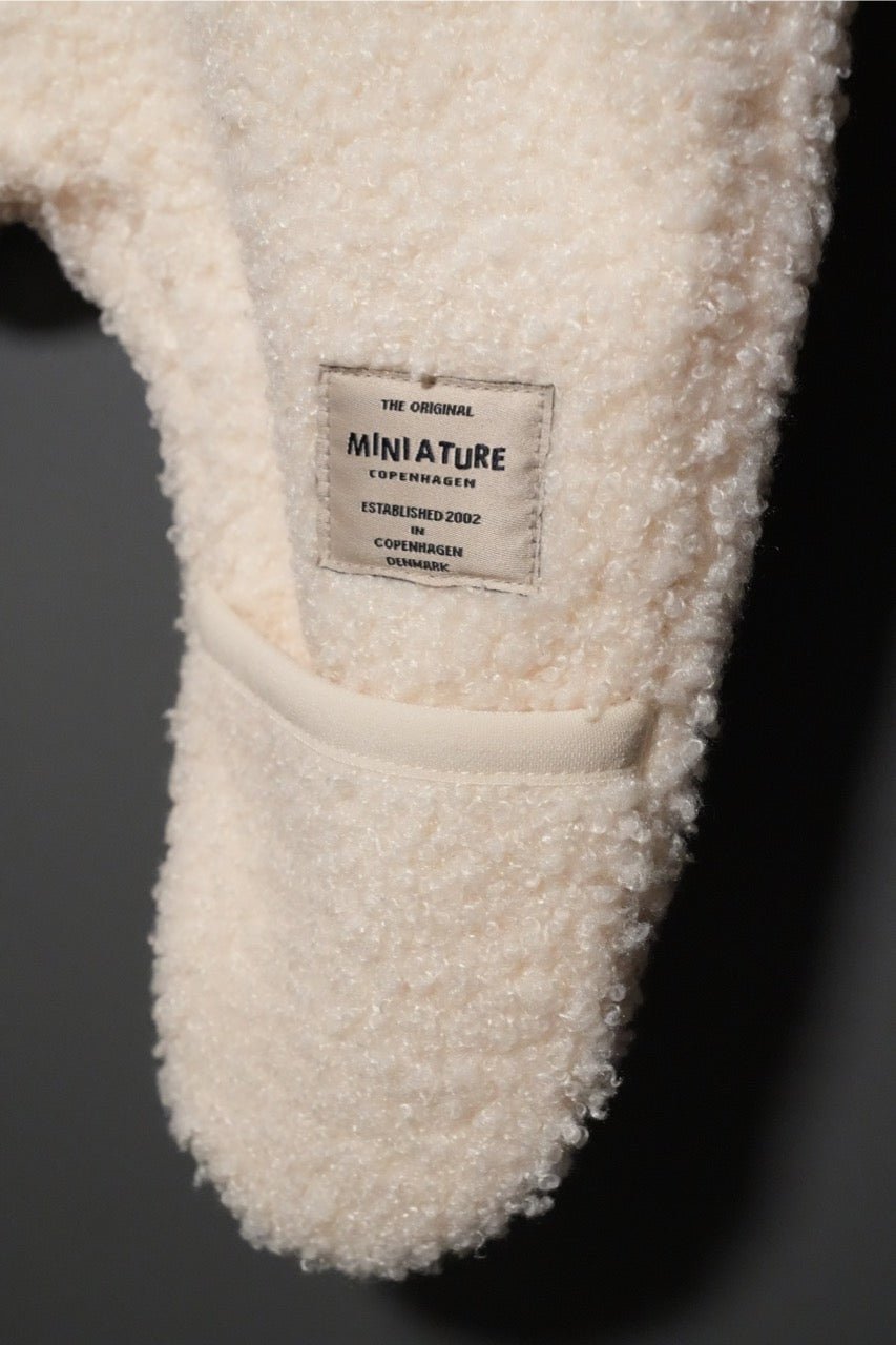 MINI A TURE MATADEL TEDDYFLEECE JUMPSUIT. GRS White swan-MATADEL0300 - Lille Univers